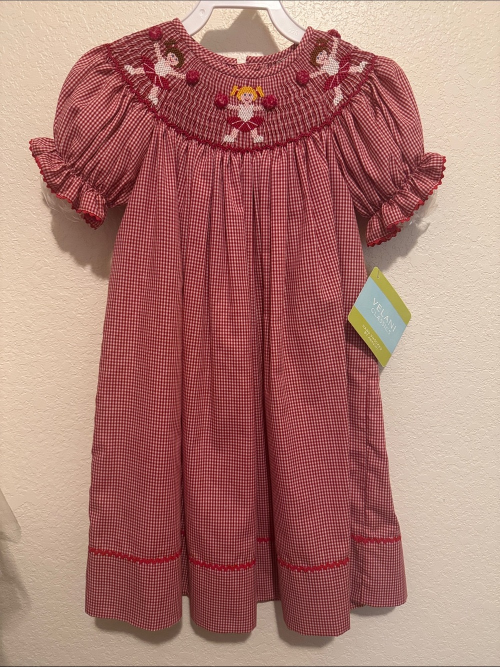 Red Gingham Smocked Girls' Dress with cheerleaders